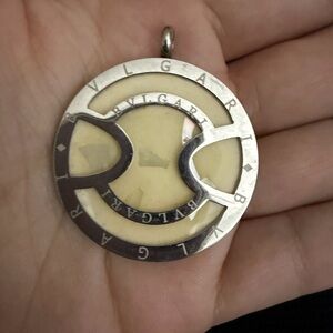 Bulgari Silver and Cream Circular Logo Pendant Necklace